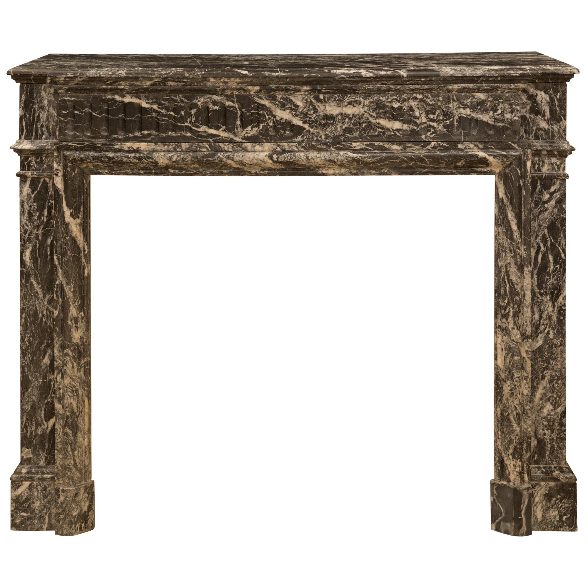 French 19th Century Louis XVI Style St Laurent Marble Mantel For Sale