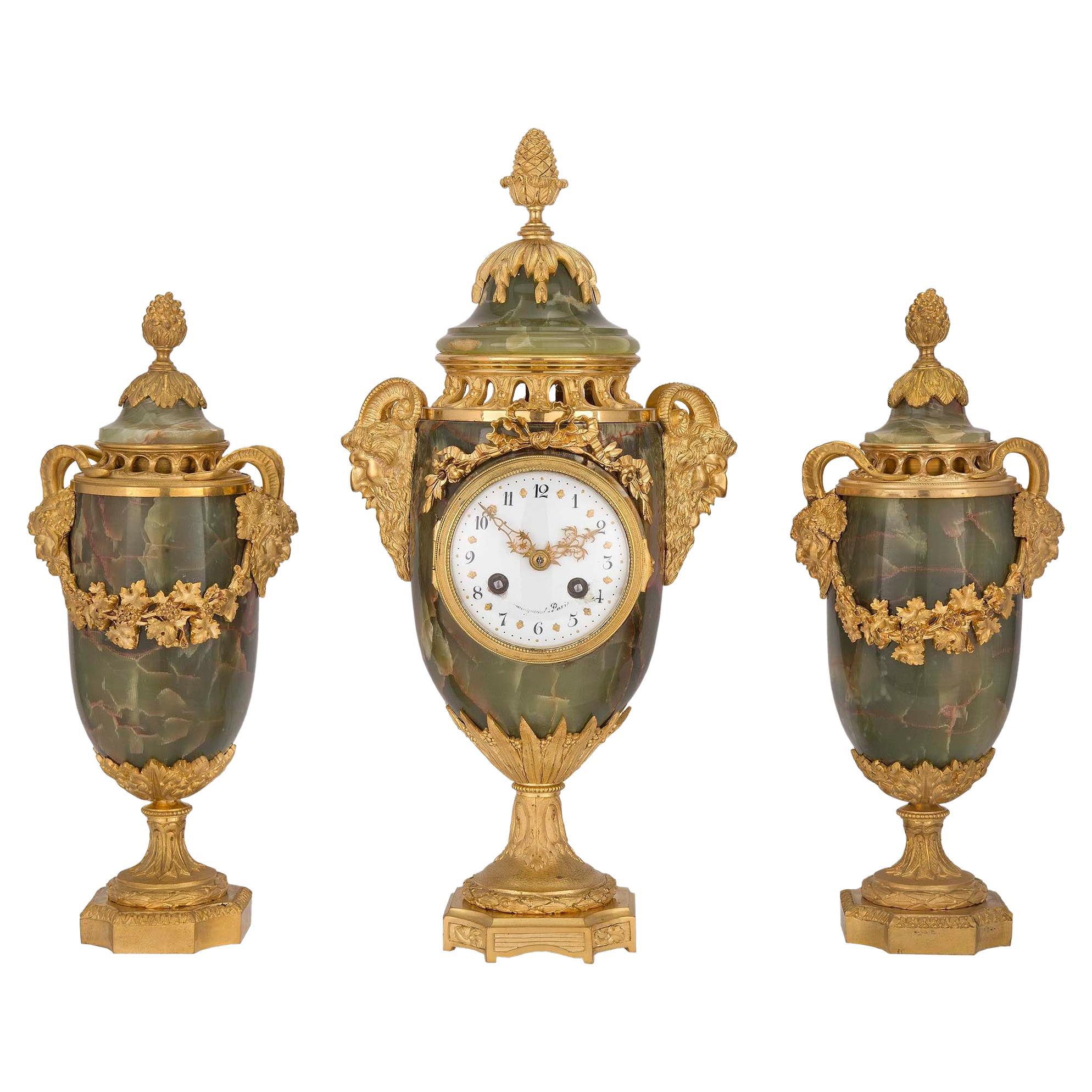 French 19th Century Louis XVI Style Three-Piece Onyx and Ormolu Garniture Set