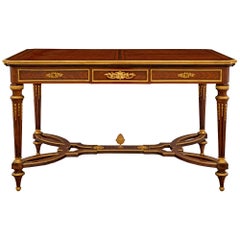 Table centrale en bois de tulipier et bronze doré de style Louis XVI du XIXe siècle