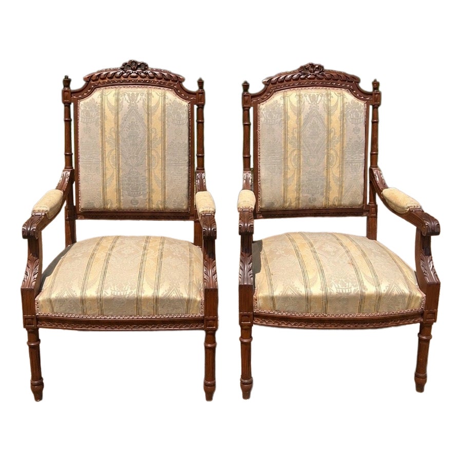 French 19th Century Louis XVI Walnut Arm Chairs - Set of 2 For Sale