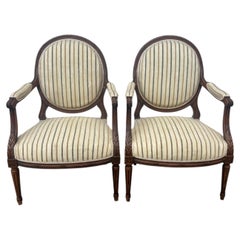 French 19th Century Louis XVI Walnut Large Arm Chairs - Set of 2