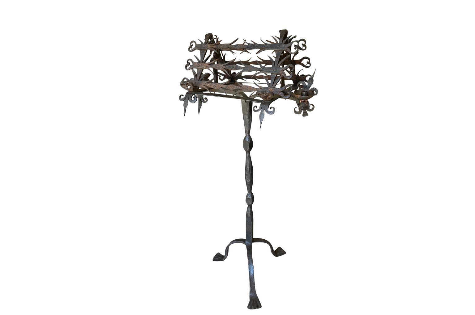 A very handsome 19th century French Double Sided Lutrin - Book Stand.  Beautifully crafted in iron.  To each side of the display area, there are pivoting candle holders.  Not only for the display of books, but for the presentation of paintings as