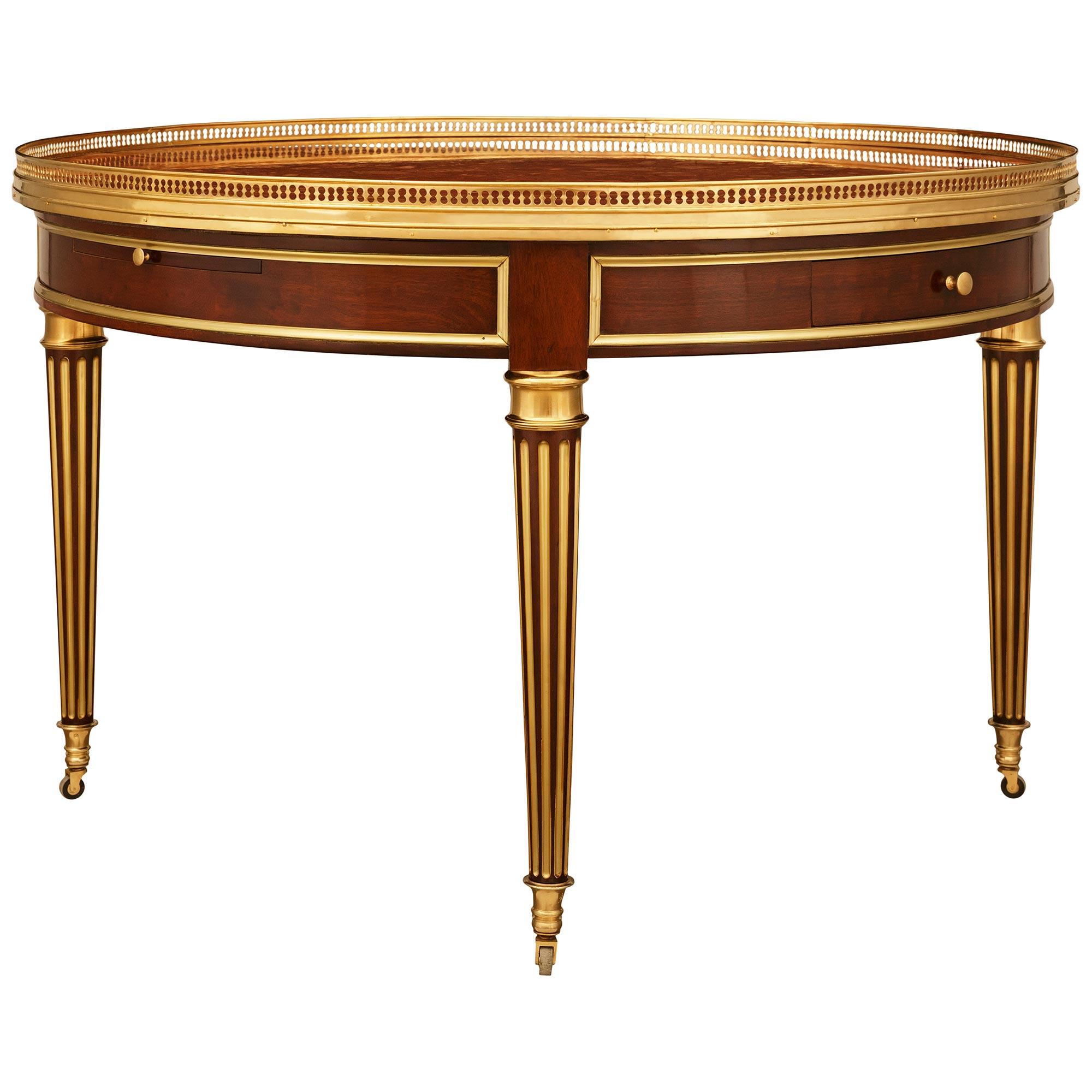 Luigi XVI French 19th century Mahogany, Brass, Ormolu and Marble center table in vendita