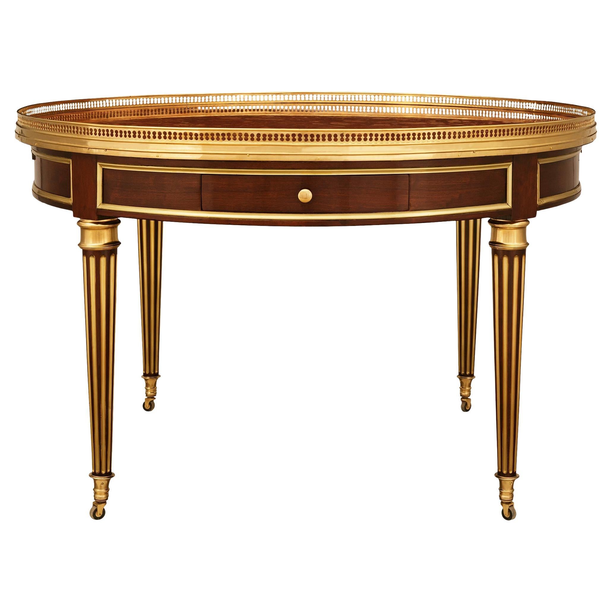 French 19th century Mahogany, Brass, Ormolu and Marble center table