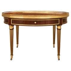 French 19th century Mahogany, Brass, Ormolu and Marble center table