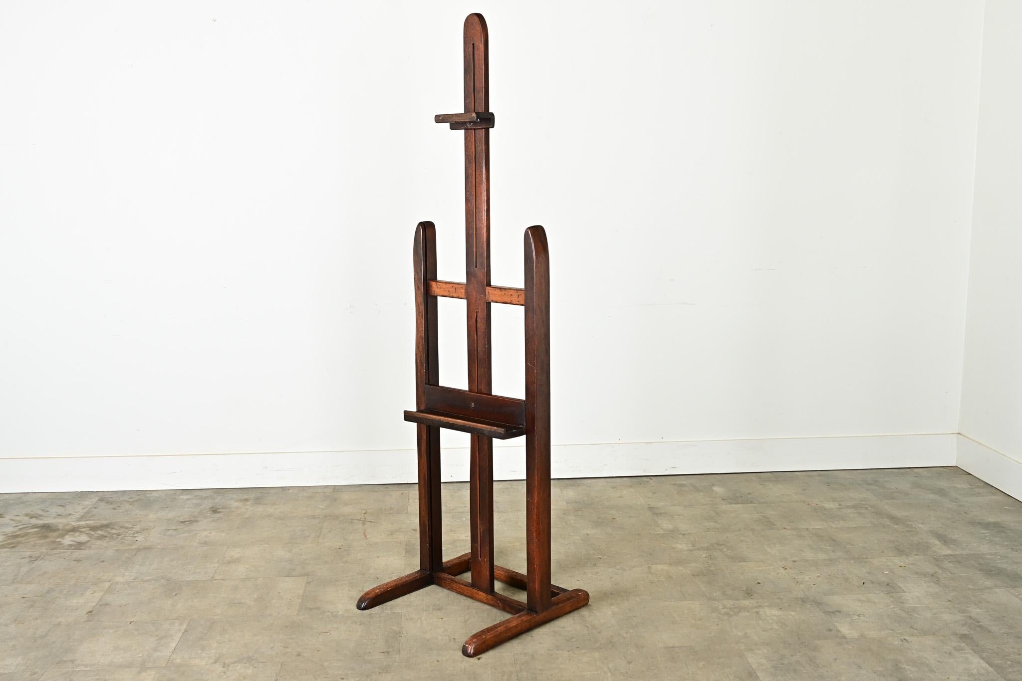 This vintage wood artist’s easel from 19th century France is an attractive solution for displaying or creating art at home or in the studio. The tall rack is easily adjustable to accommodate works-in-progress as well as exhibiting framed pieces.