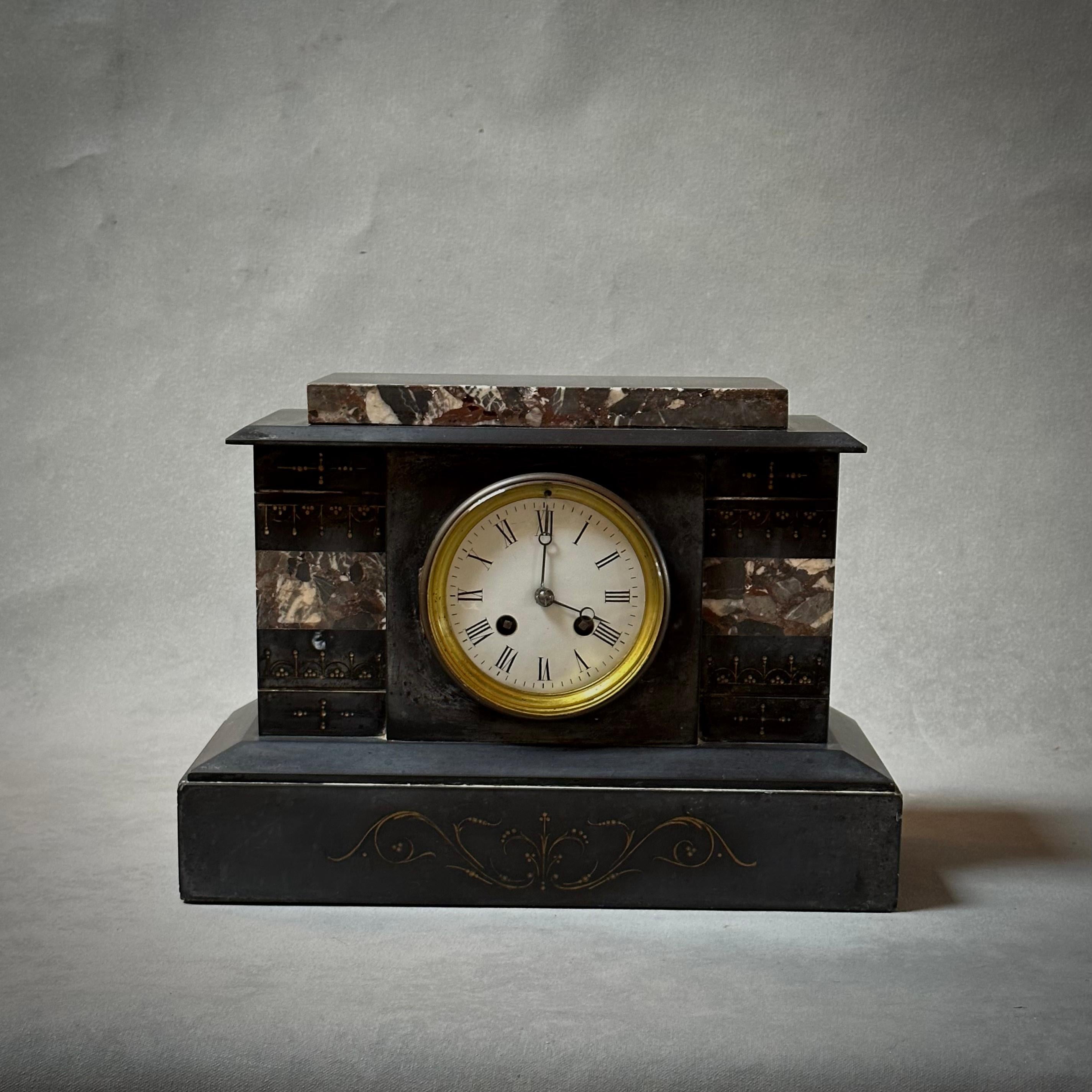 A decorative marble inlaid clock from 1880s France. A beautiful blend of neoclassical and modern elements makes this a uniquely transitional object.

France, circa 1880

Dimensions: 14W x 6D x 10H