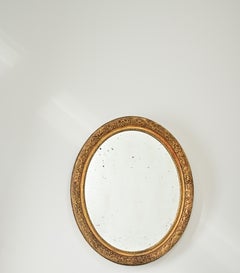 French 19th Century Massive Oval Gilt Mirror