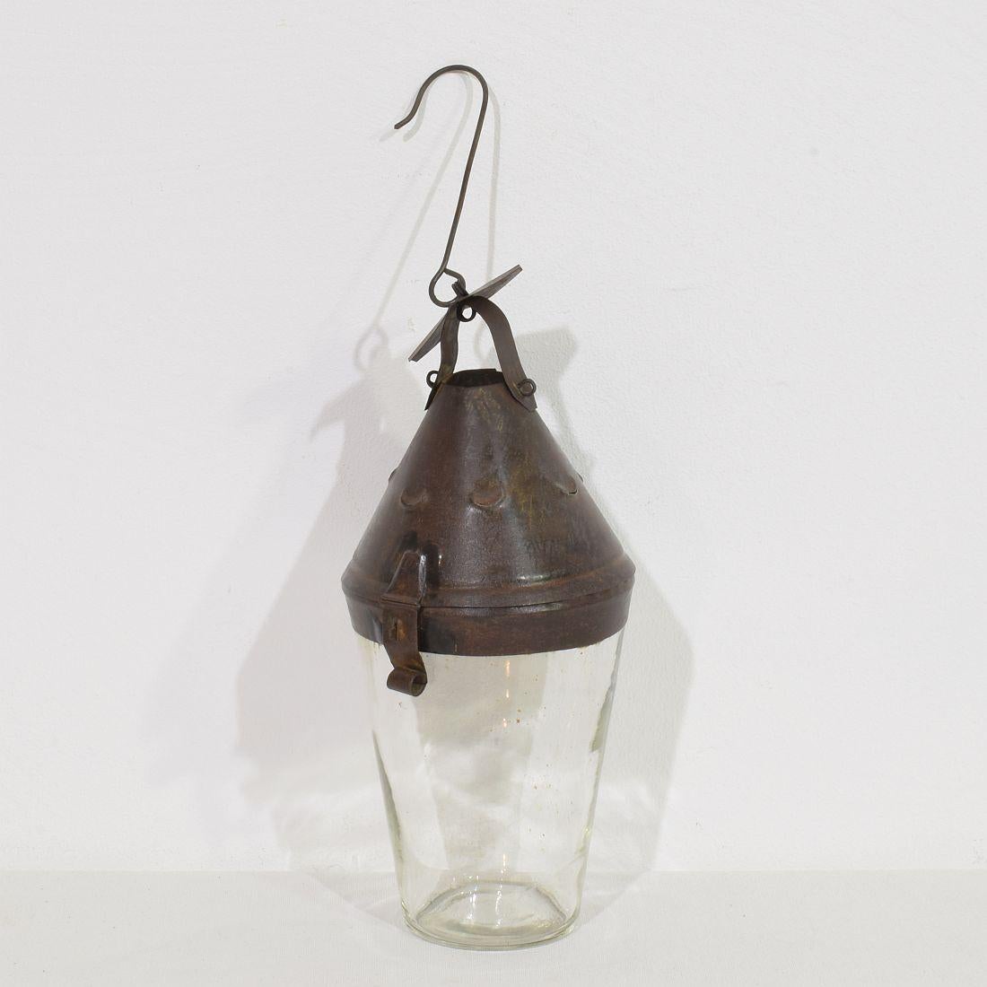 Very rare small folk art lantern, France, circa 1800-1850.

Beautiful weathered.
measurements: H:23,5/33 cm  W:10,5 cm D:11 cm 