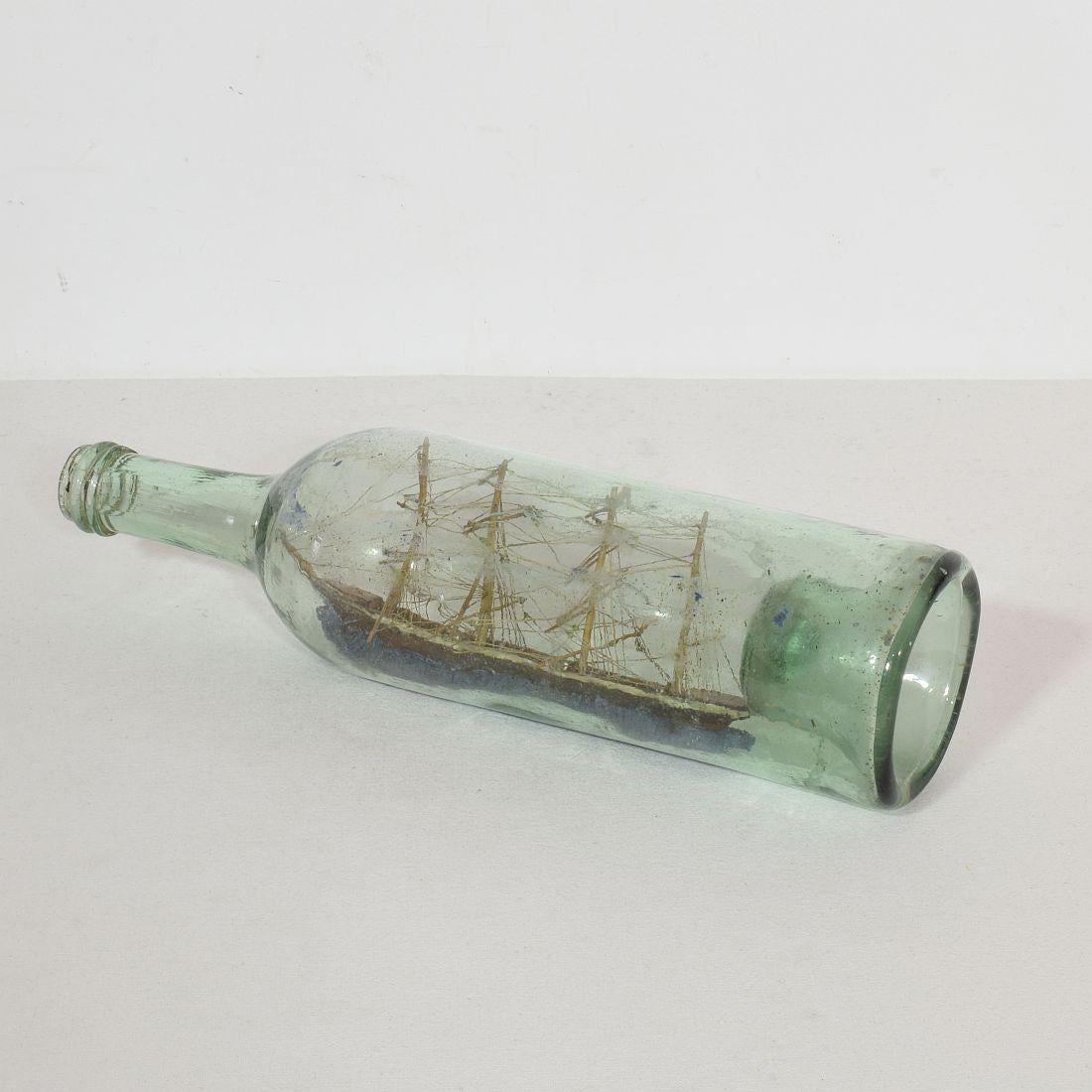 Hand-Crafted French, 19th Century, Model Ship in a Glass Bottle
