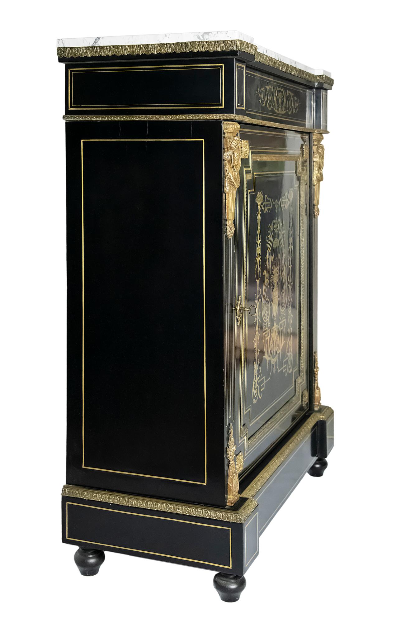 French antique Napoleon III cabinet.
Wood is black color polished surface, decorated with inlaid brass decor and bronze details ourside.
Inside the cabinet there are two shelves.
Cabinet top is marble.
This cabinet is after a very good quality