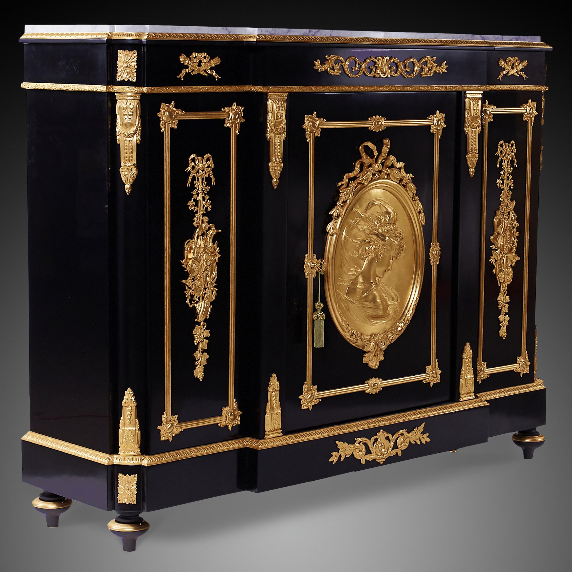 This magnificent cabinet was crafted in the Napoleon III style inspired by ancient Roman art in Paris by Charles Guillaume Diehl titled Diehl 19 r Michel-le-Comte PARIS. Many textures on the cabinet feature the symmetry of Neoclassicism. The cabinet