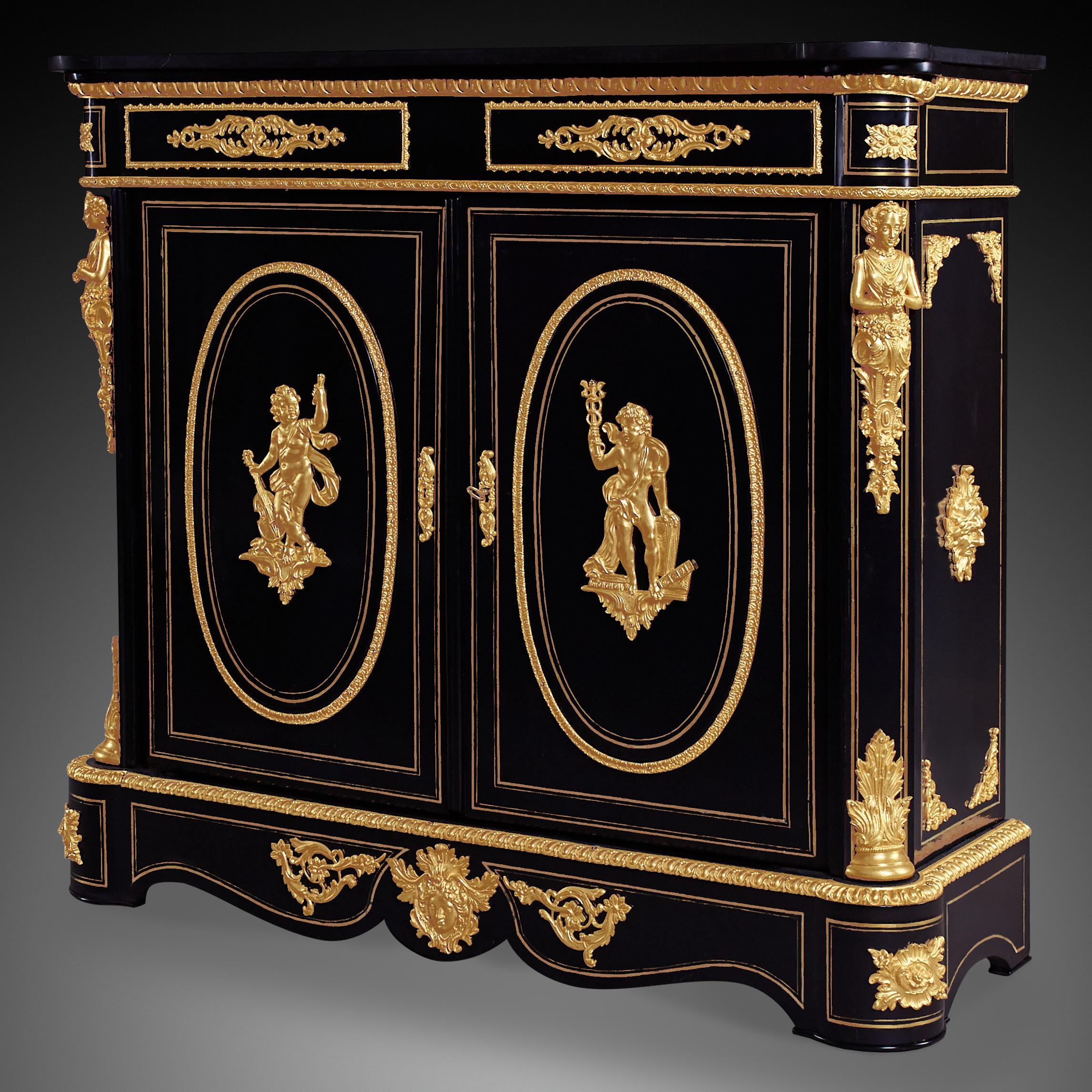 A magnificent rectangular black 2-door cabinet in Napoleon III style. Large and small details are gilt, bringing antique and luxurious looks. Brass medallions are centrally mounted on each door and also adorn the upper facade of the cabinet. The