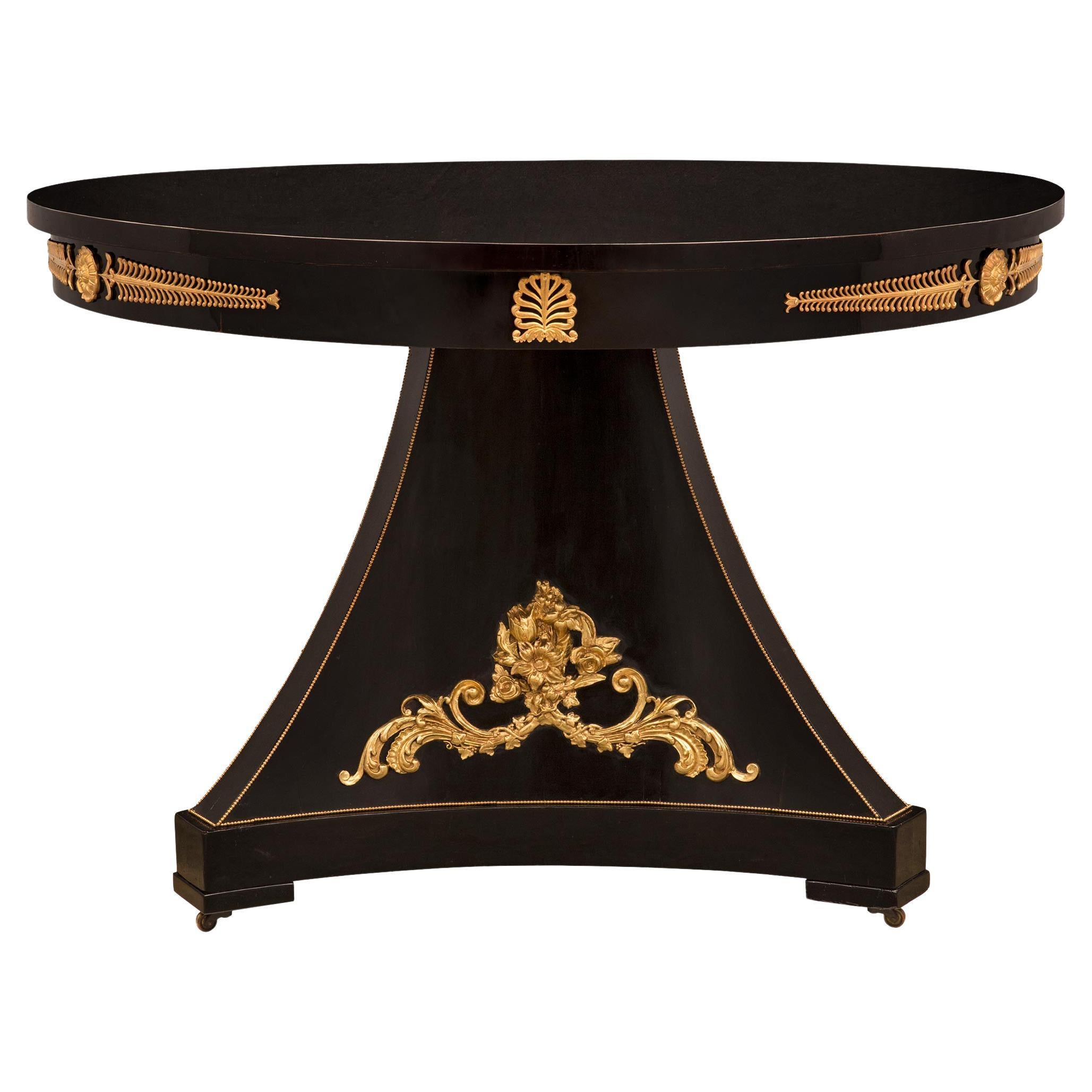 French 19th Century Napoleon III Period Ebony Ormolu and Giltwood Center Table For Sale