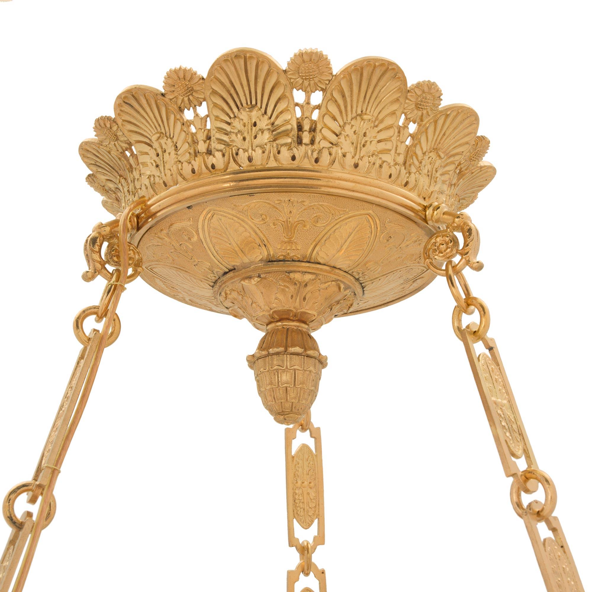 Neoclassical French 19th Century Neo-Classical St. Ormolu and Bronze Nine Arm Chandelier For Sale