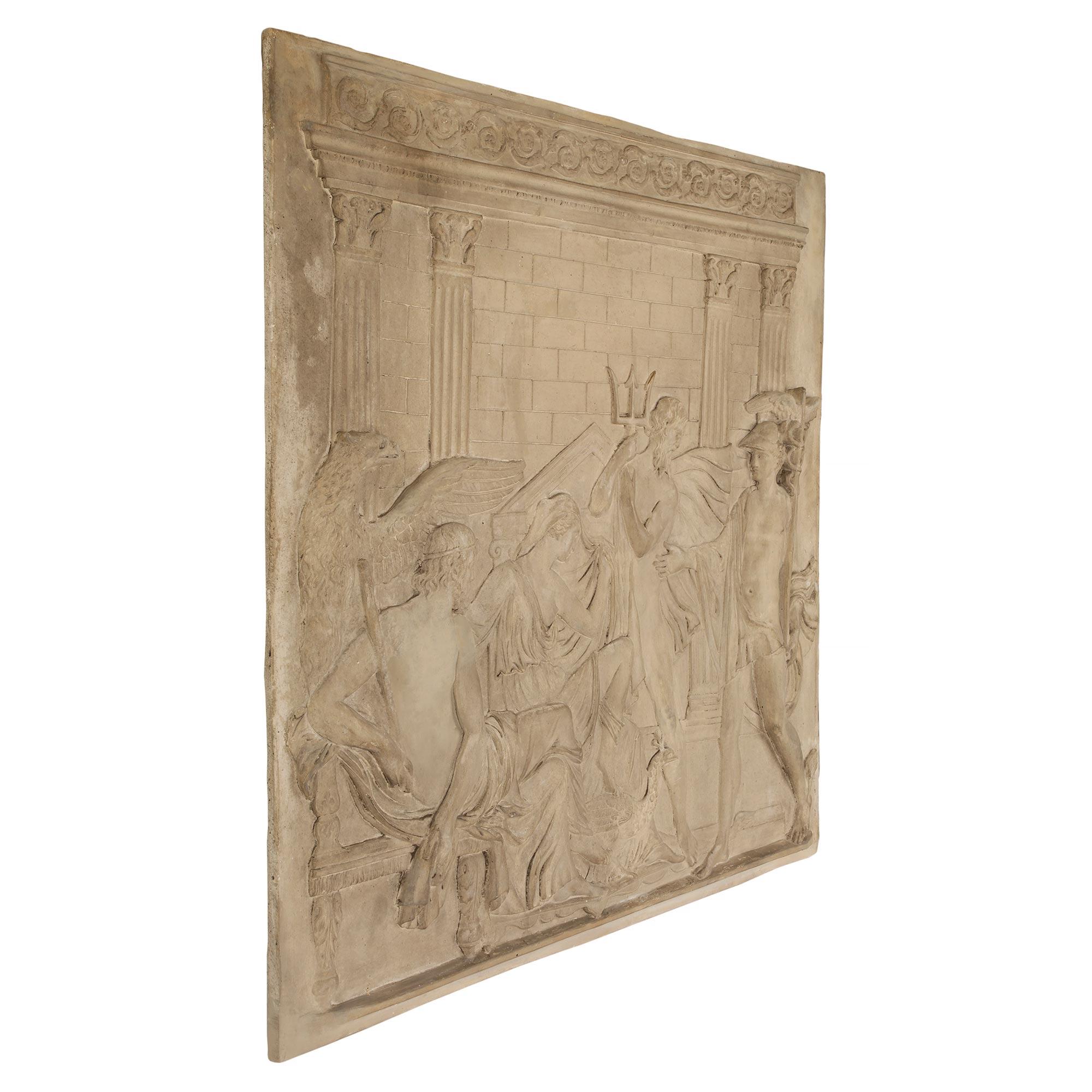 An exceptional French 19th century Neo-Classical st. plaster plaque. This extremely elegant and most decorative Parisian wall decor depicts a grouping of Mythological figures and Gods. At the center is Poseidon holding his trident while to the right