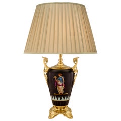 Lampe française de style néo-grec du XIXe siècle en bronze doré et porcelaine