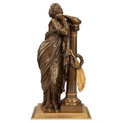 Statue de style néoclassique français du XIXe siècle en bronze patiné et bronze doré