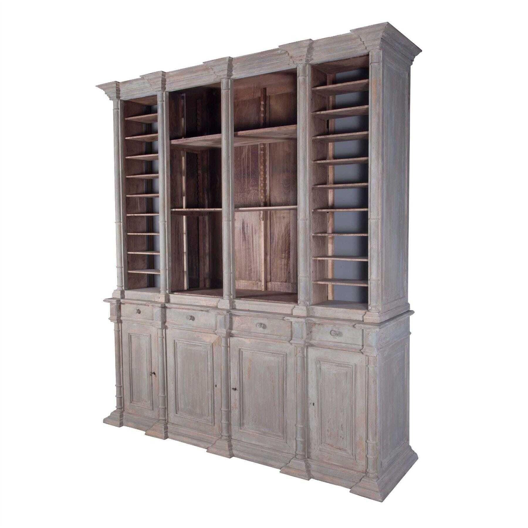Fabulous 19th century bibliothèque cupboard, from a French notaire's office. 
This fantastic cupboard is in its original condition and has a grand architectural form. The top section offers an arrangement of open shelves. Slim pigeon-hole shelves,
