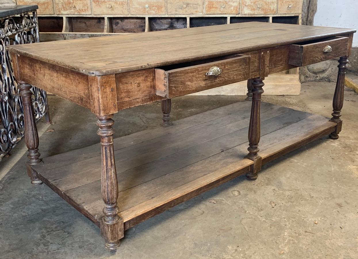 A beautiful French 19th century oak drapers table which is wider than most at 88cm wide. The oak has a lovely colour and is in good solid condition.
