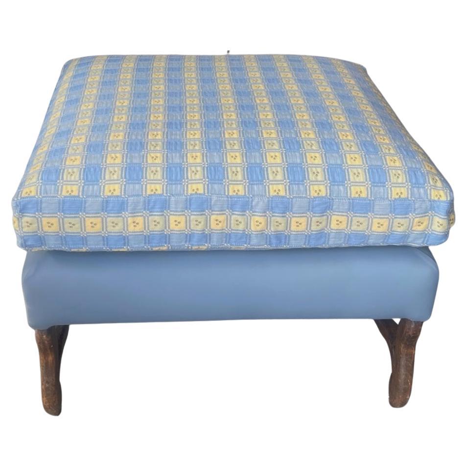 This is a fine example of a French 19 the century oak ottoman. We have reupholstered it with cotton. Ottomans were first introduced into Europe from Turkey (the heart of the Ottoman Empire, hence the name) in the late 18th century. Usually a padded,