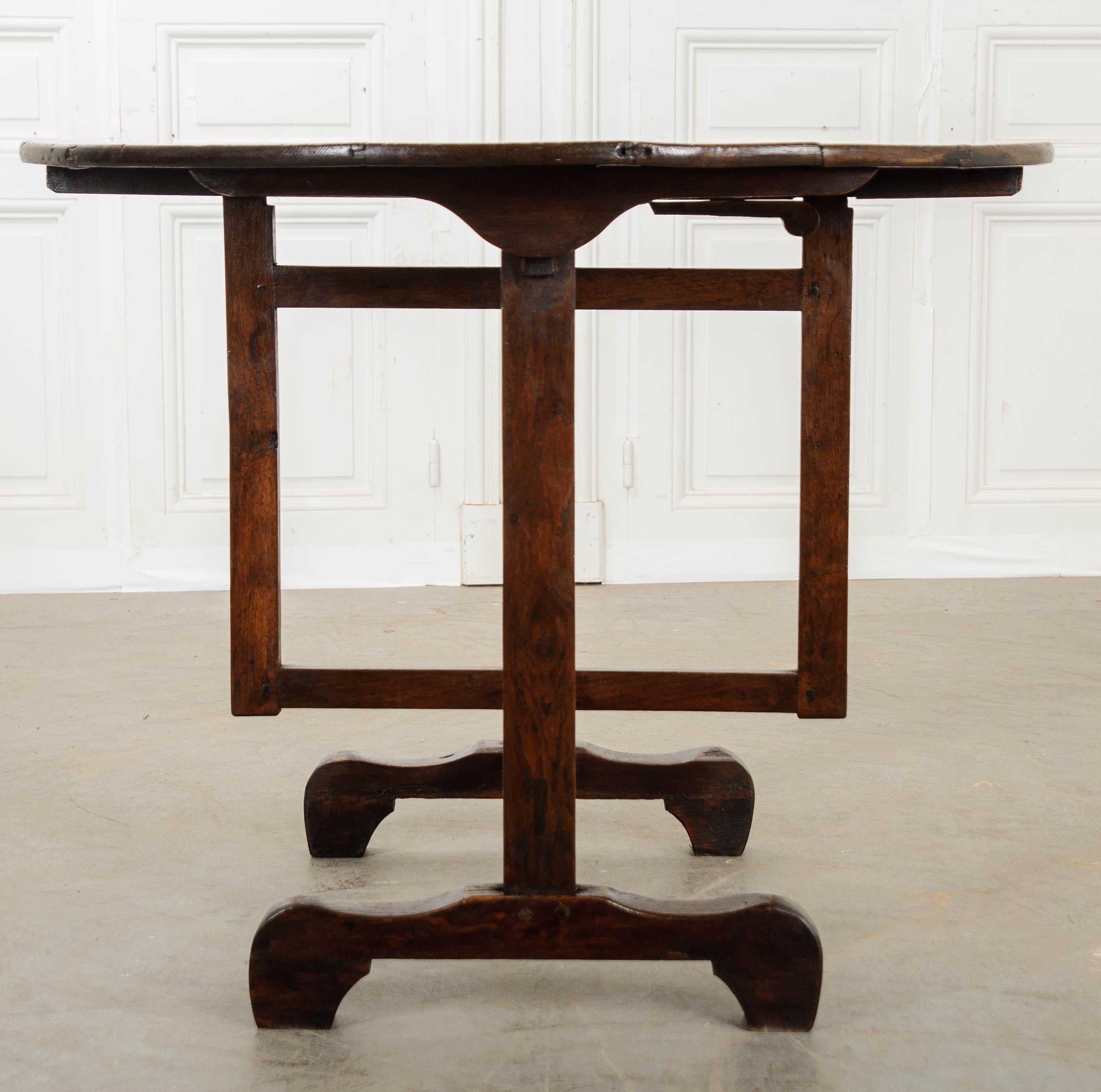 Oftentimes referred to as a “tasting table”, this specialized folding table is utilized at vineyards and wineries across Europe, providing a place to stop and taste their different vintages. This table is made of oak and has a surface height of 28-?