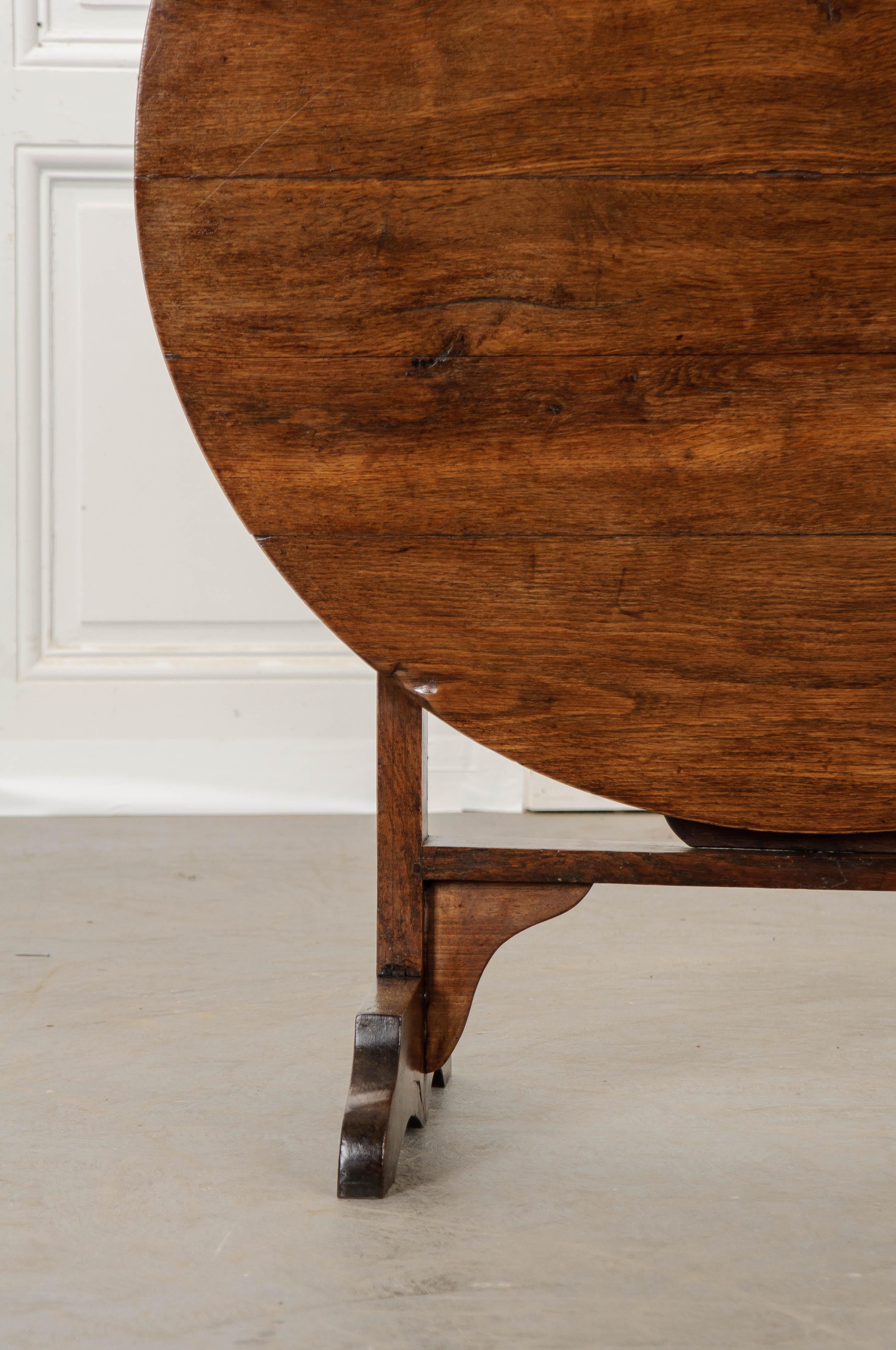 A very special oak vendange table, also known as a wine taster’s table, made in France, circa 1840. The table has a round top, made of oak with a styled base that is also made of oak. This table would have been brought out for tasting wine in the
