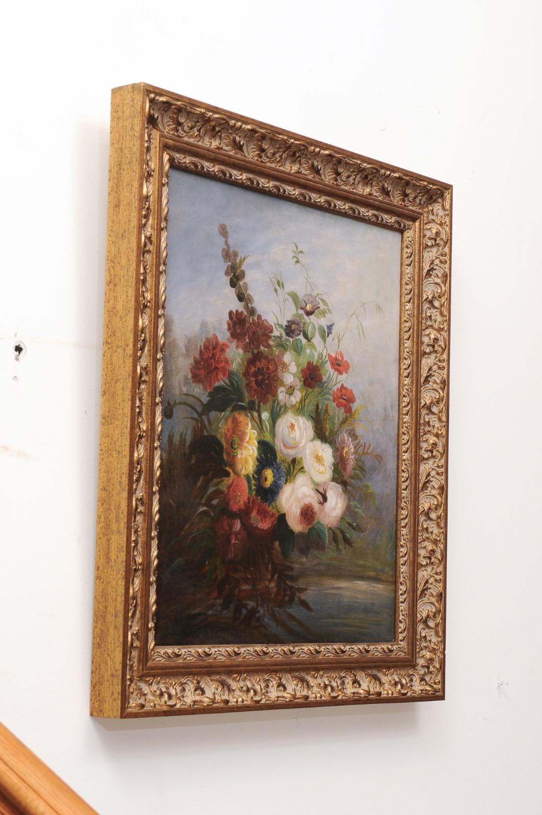 Français Peinture florale française du 19ème siècle à l'huile sur toile, circa 1830, dans un cadre doré en vente