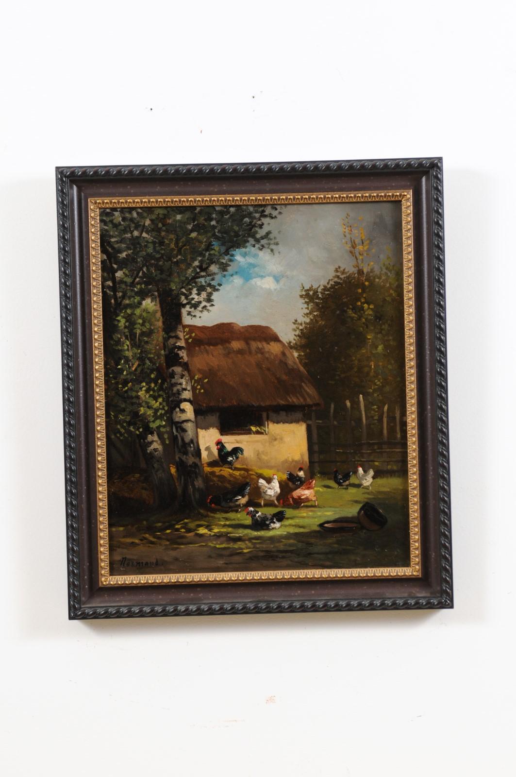 A small French oil on canvas framed painting from the 19th century, depicting a rooster and chickens in a barnyard, signed Normand. Created in France during the 19th century, this framed oil on canvas painting charms us with its humble depiction of