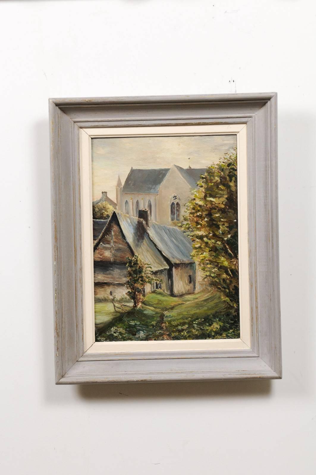 A French 19th century oil on wood landscape painting depicting a church in Brittany. This French vertical format painting depicts a scene that takes place in the Westernmost area of France, the spectacular region of Brittany. A church depicted in