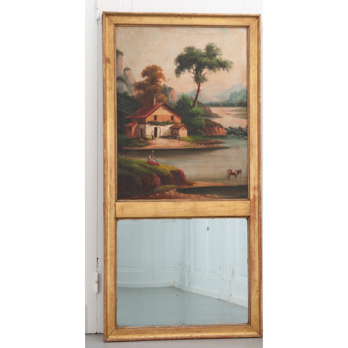 A wonderful giltwood trumeau with lovely oil painting on canvas and original mirror with foxing. The gold frame has some red bole showing through the finish and a lambs tongue detail around the mirror and painting. The painting has beautiful