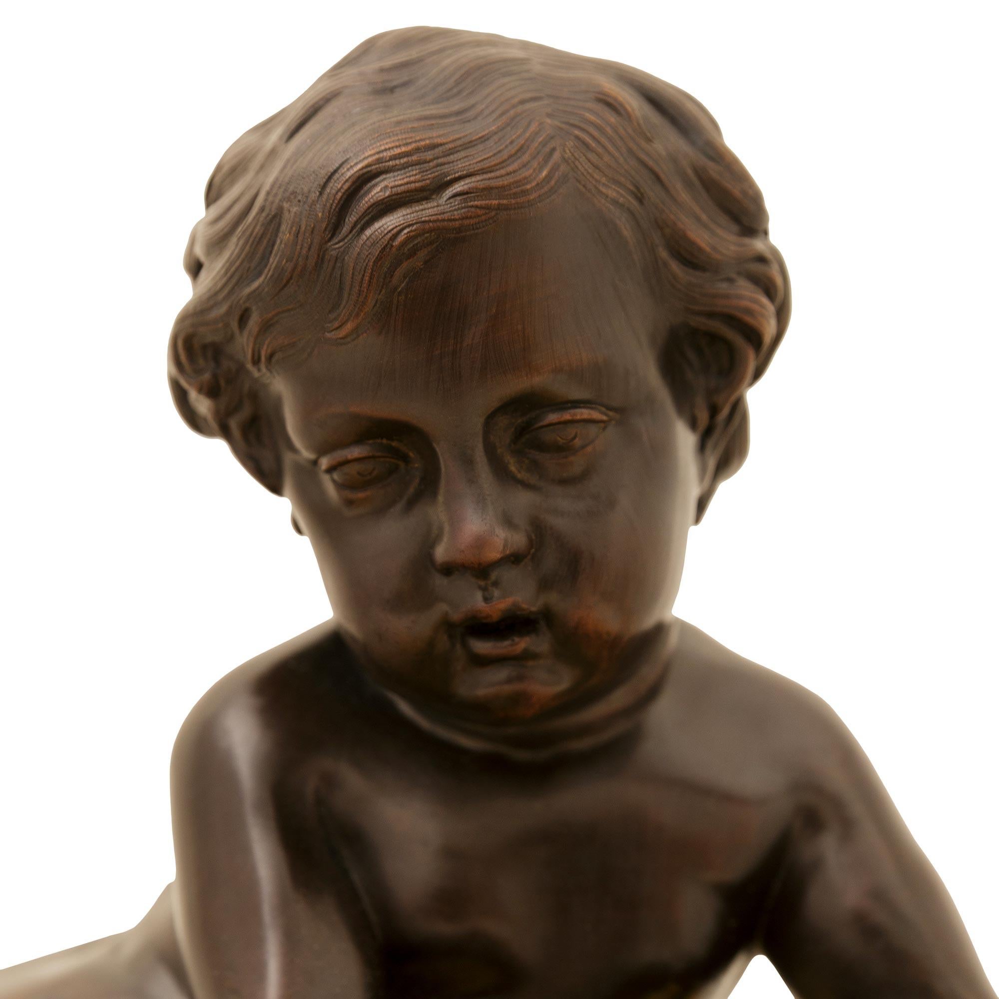 19th Century French 19th century Ormolu and Bronze clock, signed Raingo Freres For Sale