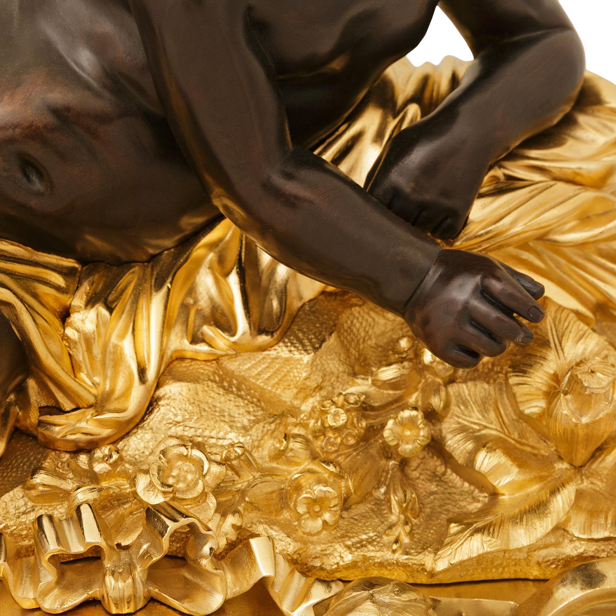 French 19th century Ormolu and Bronze clock, signed Raingo Freres For Sale 1