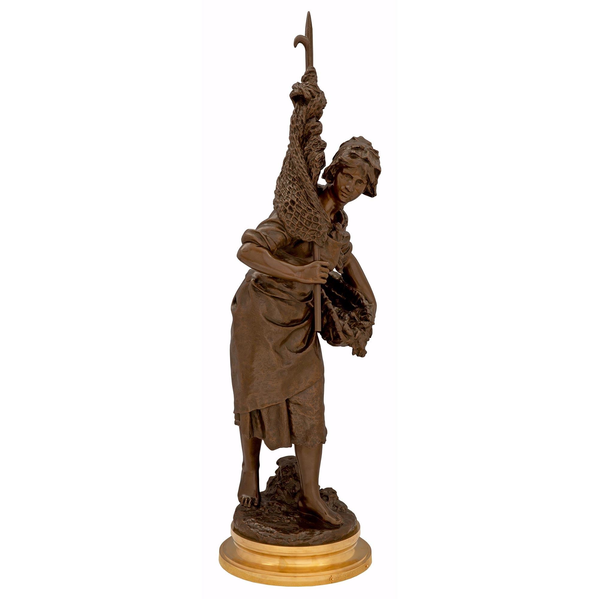 An exceptional French 19th century ormolu and patinated bronze statue titled 