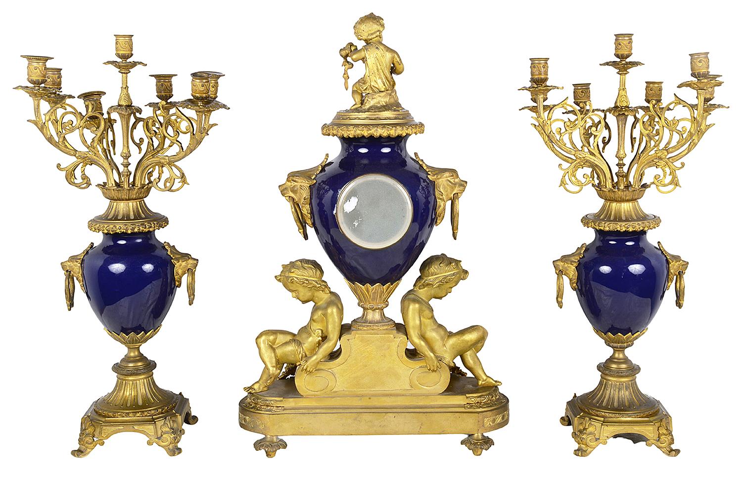 Gilt French 19th Century Ormolu and Porcelain Clock Set For Sale