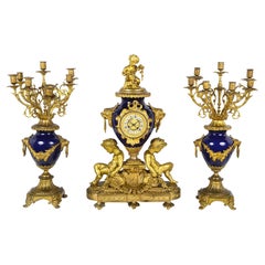 French 19th Century Ormolu and Porcelain Clock Set