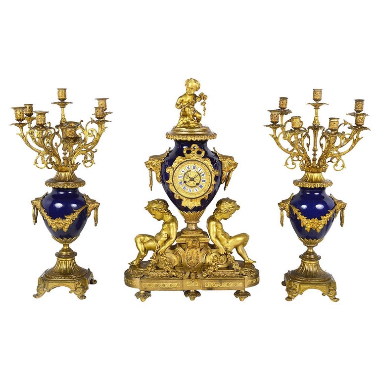 French 19th Century Ormolu and Porcelain Clock Set For Sale