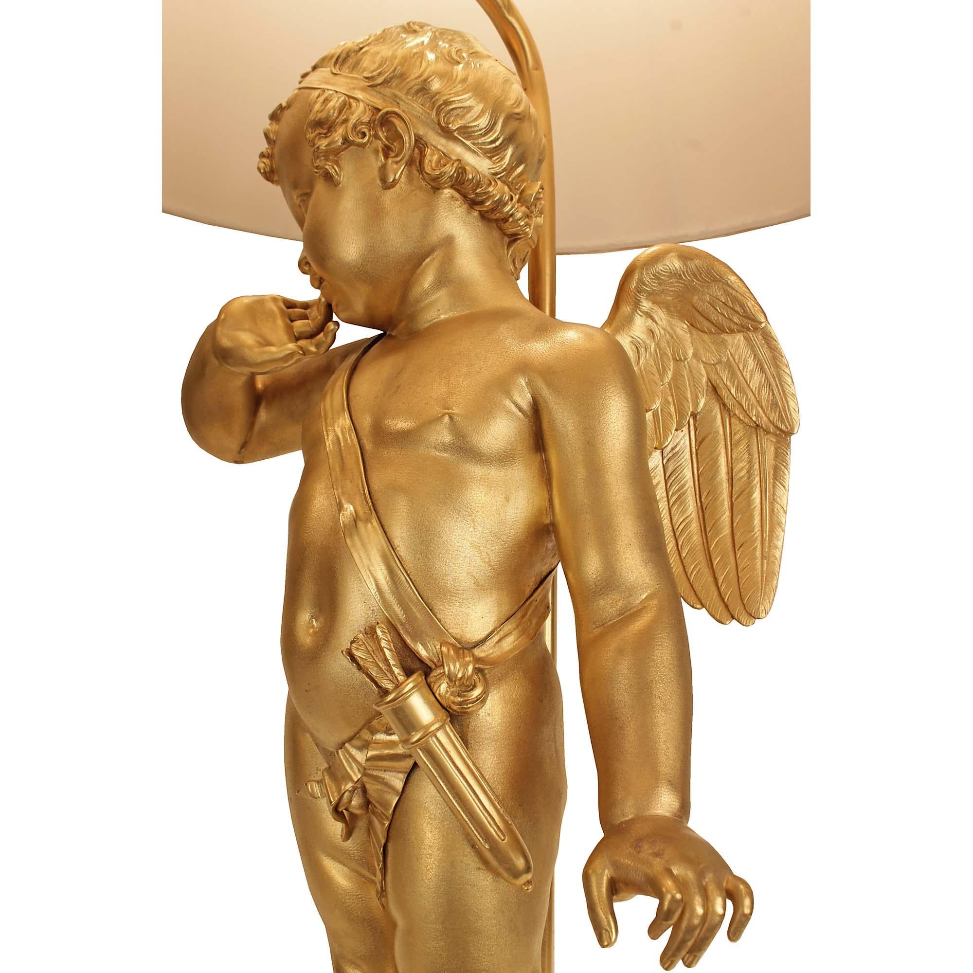 Bronze doré Lampe chérubin en bronze doré du XIXe siècle, d'après une sculpture de Pigalle en vente