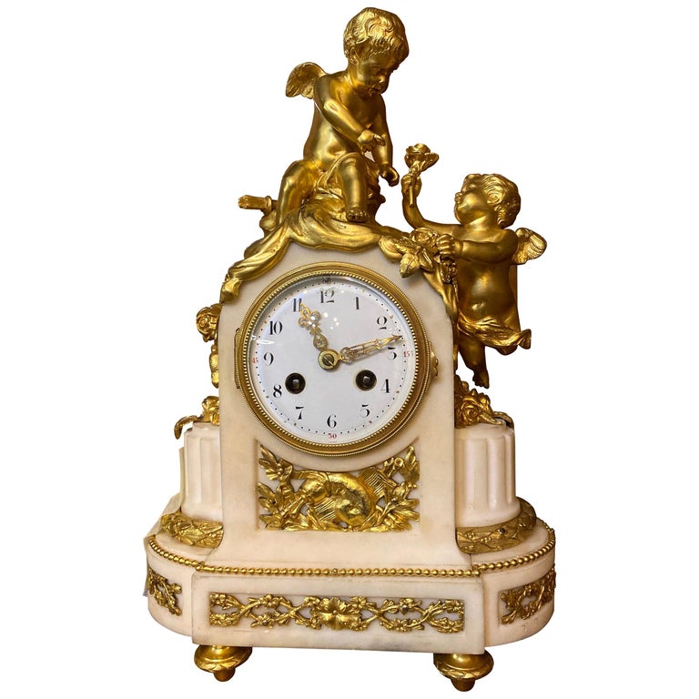 French 19th Century Ormolu White Marble Mantel Clock For Sale