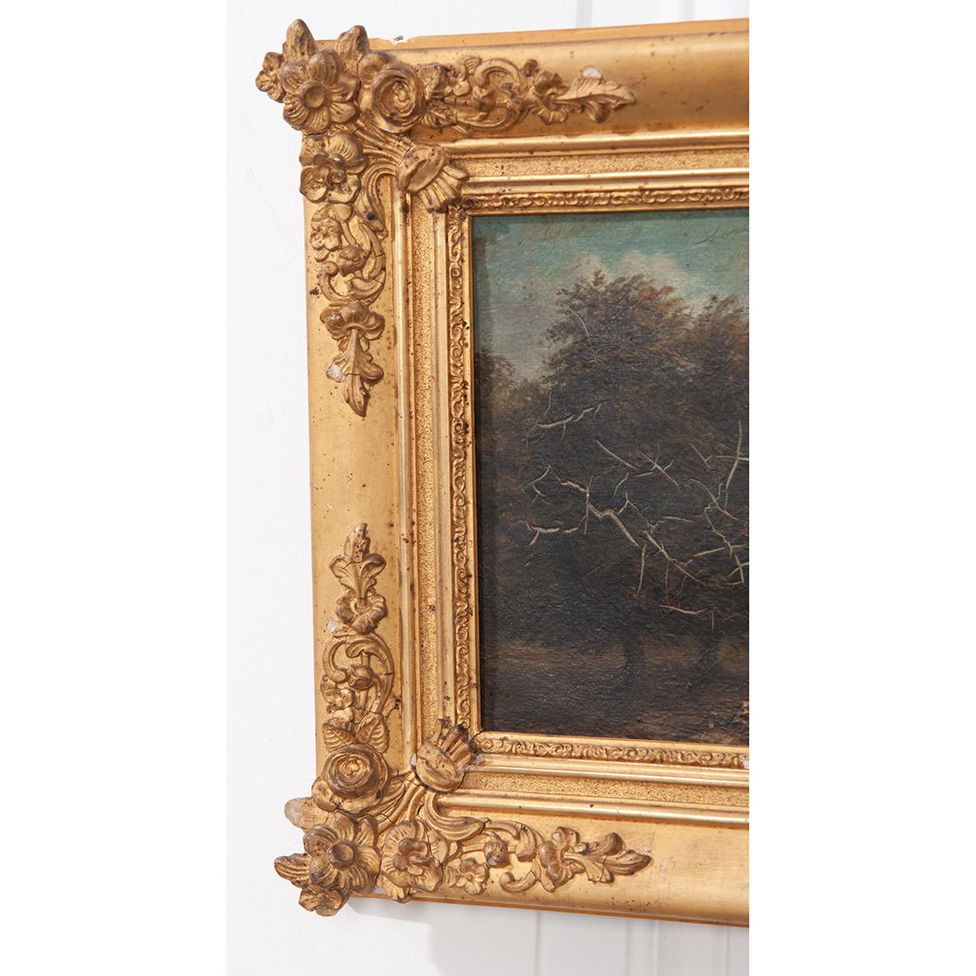 French oil painting on canvas of a cattle grazing surrounded by a distressed and decorative plaster, gilt frame. It is addressed on the back of the canvas ‘A mon ami A. LeClerc’ (To my friend LaClerc), signed and dated.