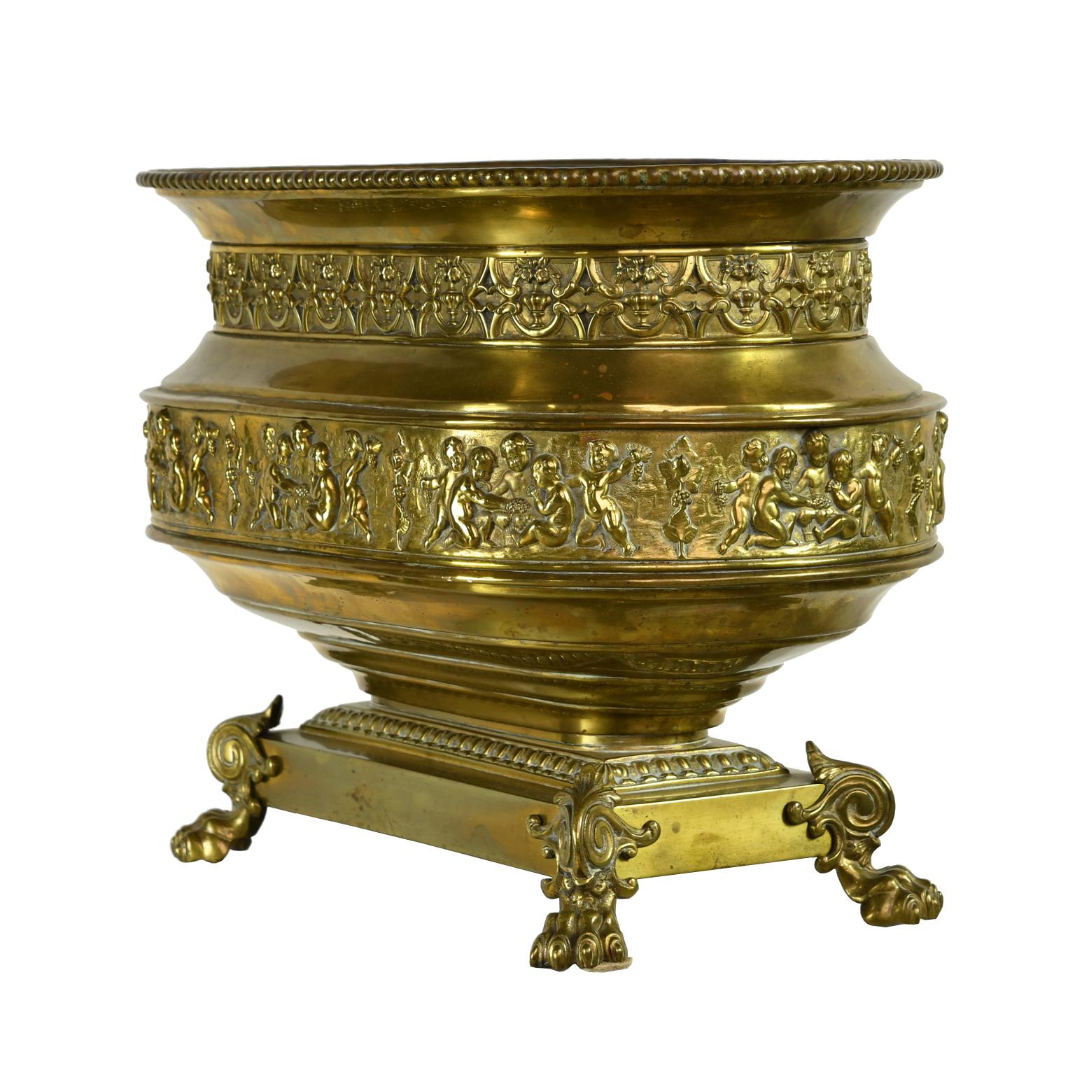 French 19th Century Oval Brass Wine Cooler or Cache Pot with Repoussé of Cherubs In Good Condition In Miami, FL