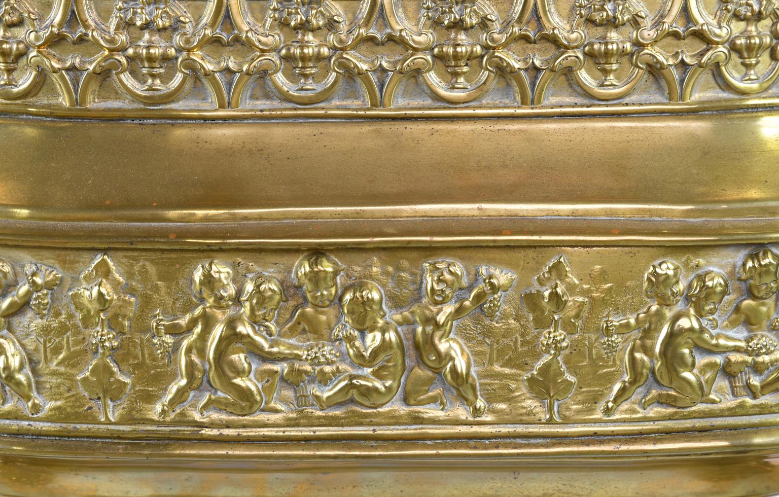 French 19th Century Oval Brass Wine Cooler or Cache Pot with Repoussé of Cherubs 2