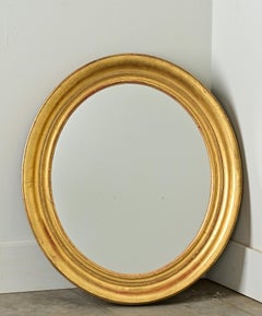 French 19th Century Oval Gilt Mirror