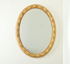 French 19th Century Oval Gilt Mirror