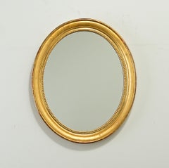 French 19th Century Oval Gold Gilt Mirror