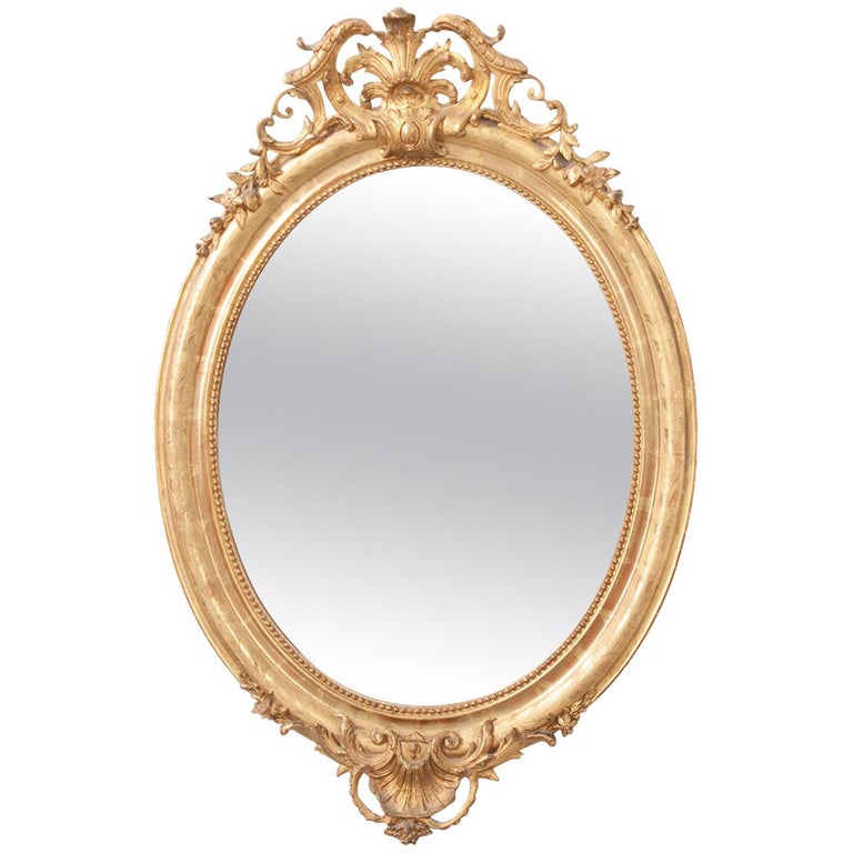 French 19th Century Oval Gold Gilt Mirror at 1stDibs