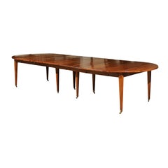 French 19th Century Oval Walnut Extension Dining Room Table with Brass Casters