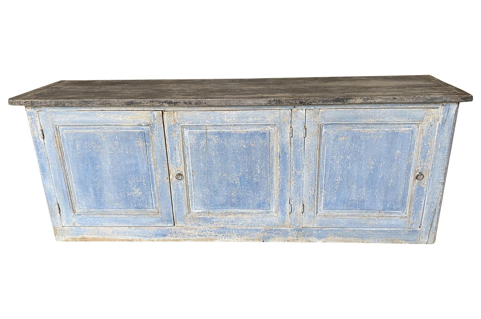 A wonderful mid-19th century buffet, enfilade from the South of France. Soundly constructed from painted wood with 3 doors and an interior shelf. A wonderful serving and storage piece.