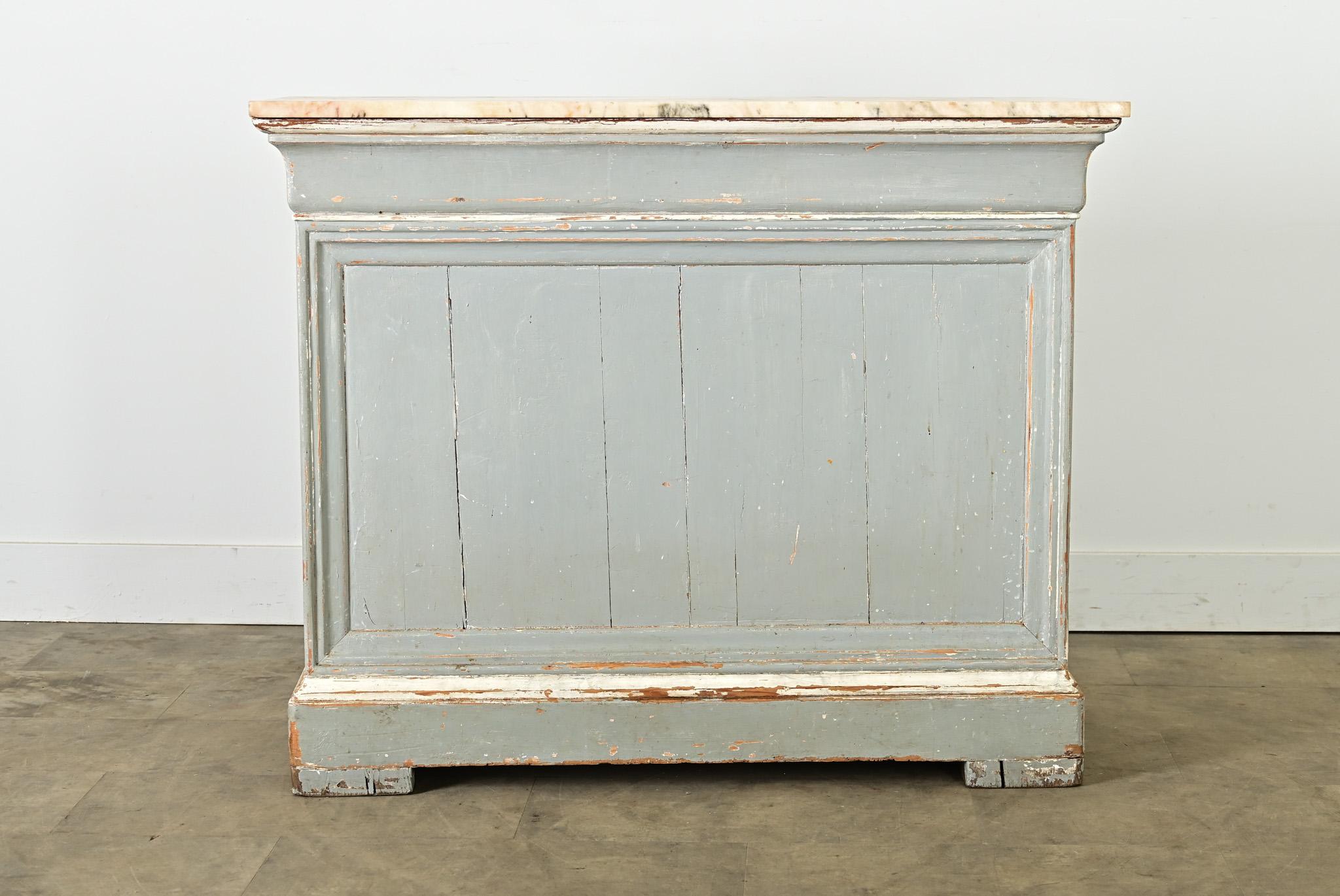 Petite painted shop counter from a 19th Century French bakery or mercantile, this unusual and outstanding counter would transform your kitchen or retail establishment. The work surface is a slab of pink marble with traces of charcoal veining and