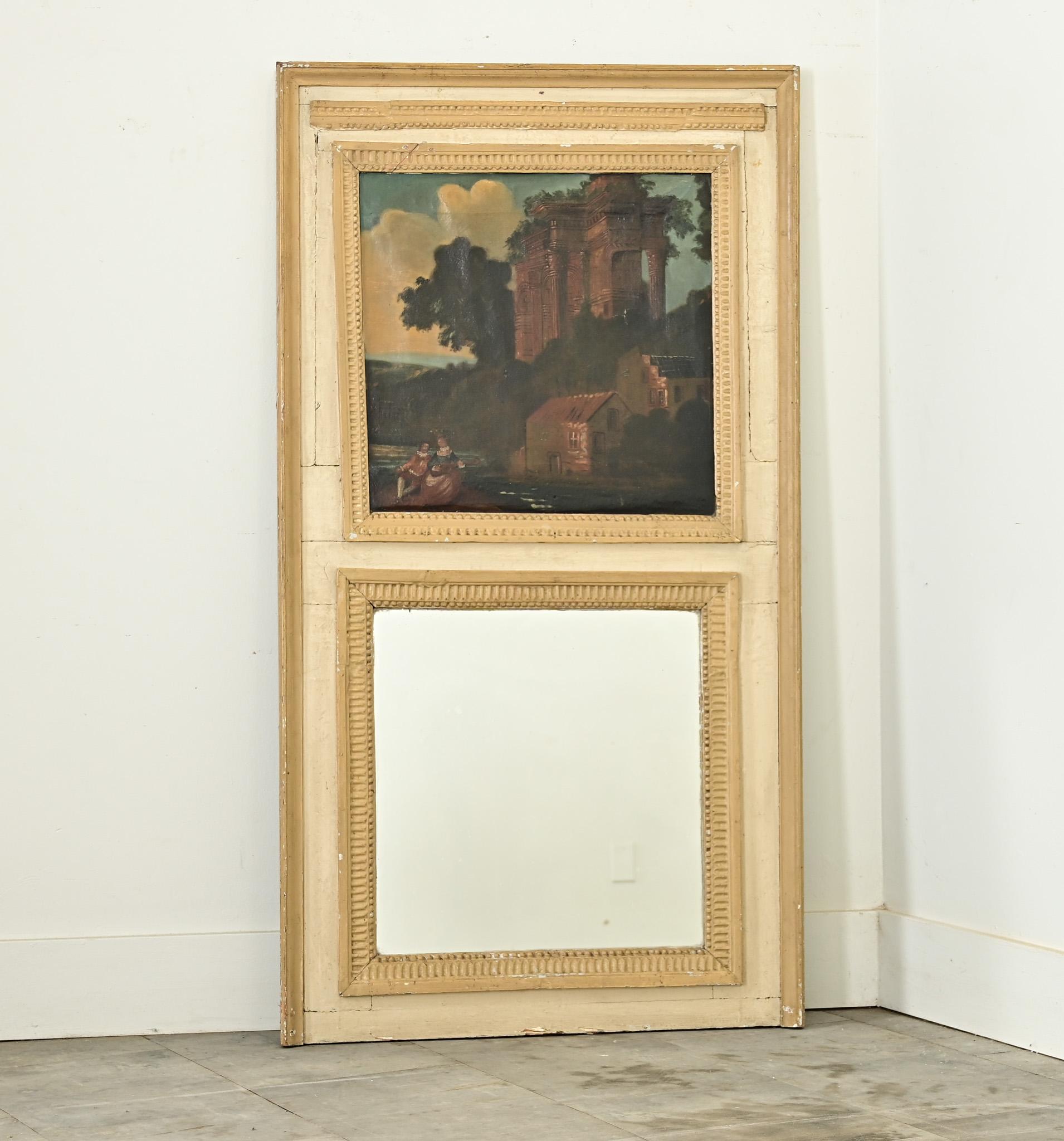 Questo romantico trumeau è un'incantevole combinazione di un pezzo architettonico e artistico. Un dipinto a olio su tela nella parte superiore raffigura un paesaggio fantasioso di antiche rovine e umili abitazioni sulle rive di un fiume, catturato